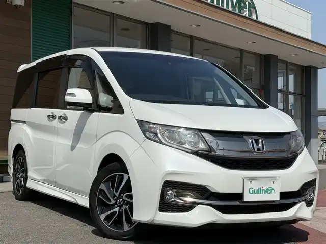 ホンダ ステップワゴン スパーダ クールスピリット 香川県 2016(平28)年 5.1万km ホワイトオーキッドパール 純正SDナビ/【フルセグ/CD/DVD/BT】/バックカメラ/ホンダセンシング/・アダプティブクルーズコントロール/・衝突軽減ブレーキ/・路外逸脱抑制機能/フリップダウンモニター/両側パワースライドドア/ハーフレザーシート/シートバックテーブル/LEDヘッドライト/純正17インチアルミ/純正フロアマット/純正ビルトインETC