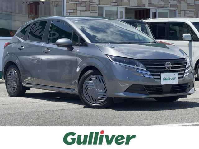 日産 ノート X 徳島県 2024(令6)年 0.4万km ダークメタルグレー 純正9インチナビ/(AM.FM.BT.フルセグ)/全周囲カメラ/バックカメラ/フルセグTV/ETC/ドライブレコーダー（前のみ）/コーナーセンサー（前後）/USB入力端子/純正フロアマット/横滑り防止装置/盗難防止装置/衝突軽減システム