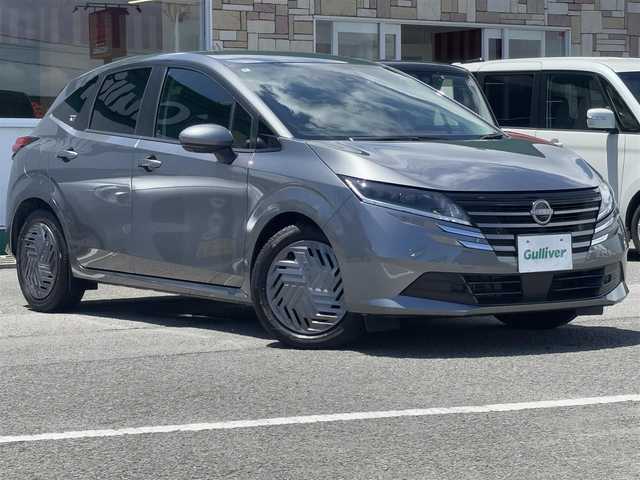 日産 ノート X 徳島県 2024(令6)年 0.4万km ダークメタルグレー 純正9インチナビ/(AM.FM.BT.フルセグ)/全周囲カメラ/バックカメラ/フルセグTV/ETC/ドライブレコーダー（前のみ）/コーナーセンサー（前後）/USB入力端子/純正フロアマット/横滑り防止装置/盗難防止装置/衝突軽減システム