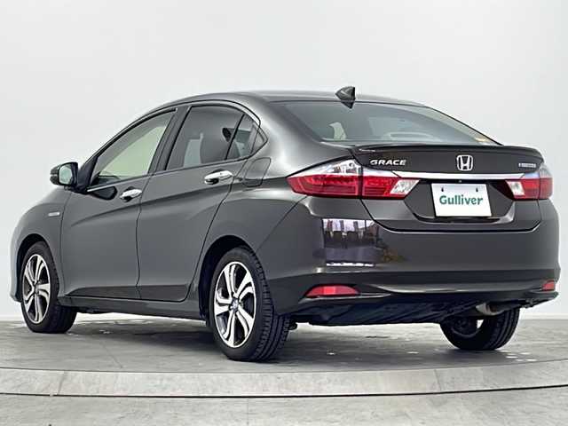 ホンダ グレイス ハイブリッド EX 大阪府 2014(平26)年 8.2万km ゴールドブラウンM 純正ナビ(フルセグTV/FM/AM/CD/DVD/MT/USB)/バックカメラ/前後ドライブレコーダー/ＥＴＣ/横滑り防止装置/盗難防止装置/クルーズコントロール　/パドルシフト/オートライト/ハーフレザー/シートヒーター/純正ＡＷ/純正フロアマット/スマートキー/スペアキー/保証書/記録簿/取扱説明書