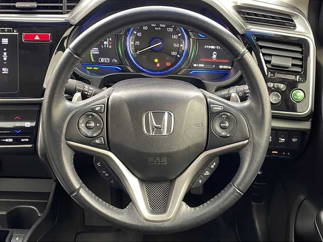 ホンダ グレイス ハイブリッド EX 大阪府 2014(平26)年 8.2万km ゴールドブラウンM 純正ナビ(フルセグTV/FM/AM/CD/DVD/MT/USB)/バックカメラ/前後ドライブレコーダー/ＥＴＣ/横滑り防止装置/盗難防止装置/クルーズコントロール　/パドルシフト/オートライト/ハーフレザー/シートヒーター/純正ＡＷ/純正フロアマット/スマートキー/スペアキー/保証書/記録簿/取扱説明書