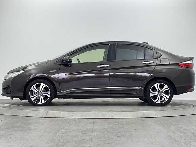 ホンダ グレイス ハイブリッド EX 大阪府 2014(平26)年 8.2万km ゴールドブラウンM 純正ナビ(フルセグTV/FM/AM/CD/DVD/MT/USB)/バックカメラ/前後ドライブレコーダー/ＥＴＣ/横滑り防止装置/盗難防止装置/クルーズコントロール　/パドルシフト/オートライト/ハーフレザー/シートヒーター/純正ＡＷ/純正フロアマット/スマートキー/スペアキー/保証書/記録簿/取扱説明書