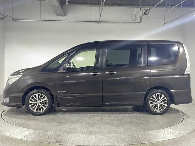 日産 セレナ ハイウェイスター Sハイブリッド 神奈川県 2014(平26)年 5万km タイガーアイブラウン 純正7型SDナビゲーション【MP313D-W】/AM FM Bluetooth フルセグ CD DVD/バックカメラ/片側パワースライドドア/エマージェンシーブレーキ/クルーズコントロール/ビルトインETC/ECOモード/サンシェード/純正フロアマット/オートライト/ヘッドライトレベライザー/電格ミラー/純正15インチアルミホイル