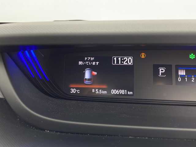 ホンダ フリード G ブラックスタイル 鹿児島県 2023(令5)年 0.7万km パール ホンダセンシング　/純正９型ナビ/（フルセグ/Bluetooth/DVD/CD）/アダプティブクルーズコントロール　/前後ドライブレコーダー　/両側パワースライドドア　/パドルシフト　/前席シートヒーター　/サンシェード　/ＥＴＣ２．０　/バックカメラ　/純正１５インチアルミホイール/三列シート/シートリフター/純正ドアバイザー/スぺキー1本/保証書/取扱説明書