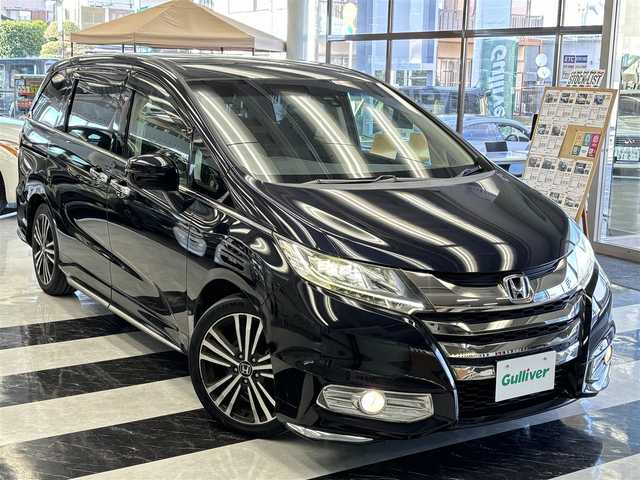 ホンダ オデッセイ アブソルート 千葉県 2014(平26)年 8.8万km プレミアムヴィーナスブラックP ７人乗り/両側パワースライドドア/シティブレーキアシスト/純正インターナビ/・フルセグTV/・Bluetoothオーディオ/・HDMI接続可/・USB端子２個/純正後席フリップダウンモニター/バックカメラ/ビルトインETC/コムテック　フロントドライブレコーダー　HDR-102/アイドリングストップ/クルーズコントロール/パドルシフト/ハーフレザーシート/後席ロールサンシェード/純正フロアマット/取扱説明書/ナビ取扱説明書/保証書