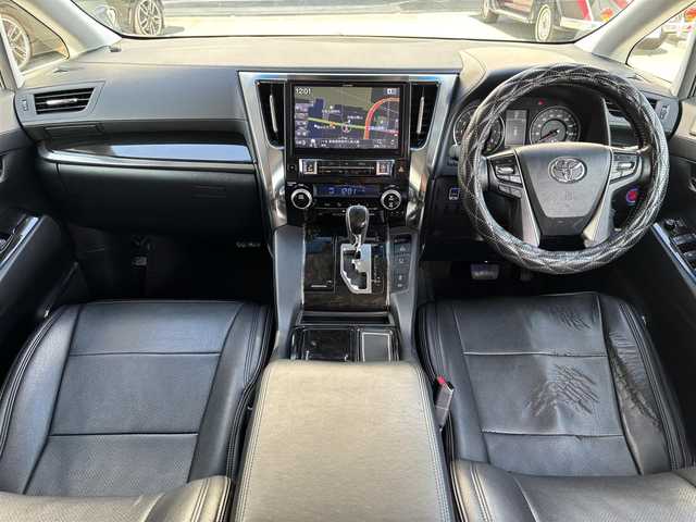 トヨタ ヴェルファイア Z Gエディション 奈良県 2016(平28)年 13万km ブラック ワンオーナー/アルパイン10インチナビ/CD/DVD/BT/USB/フルセグ/バックカメラ/黒半革シート/革調シートカバー/パワーシート（前席）/メモリーシート/ドライブレコーダー（前方）/ETC/ACC/PBD/横滑り防止装置/前後クリアランスソナー/レーダーブレーキサポート/両側パワースライドドア/LEDオートライト/フォグランプ（黄）/オートリトラウィンカーミラー/LEDルームランプ/フットランプ（青）/革巻きステアリング/ステアリングスイッチ/ステアリングヒーター/電子制御パーキングブレーキ/ブレーキホールド/オットマン/純正フロアマット/純正ドアバイザー/スペアスマートキー/新車時保証書/取扱説明書/ナビ取扱説明書/ディーラー記録簿R7