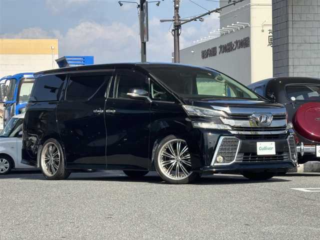 トヨタ ヴェルファイア Z Gエディション 奈良県 2016(平28)年 13万km ブラック ワンオーナー/アルパイン10インチナビ/CD/DVD/BT/USB/フルセグ/バックカメラ/黒半革シート/革調シートカバー/パワーシート（前席）/メモリーシート/ドライブレコーダー（前方）/ETC/ACC/PBD/横滑り防止装置/前後クリアランスソナー/レーダーブレーキサポート/両側パワースライドドア/LEDオートライト/フォグランプ（黄）/オートリトラウィンカーミラー/LEDルームランプ/フットランプ（青）/革巻きステアリング/ステアリングスイッチ/ステアリングヒーター/電子制御パーキングブレーキ/ブレーキホールド/オットマン/純正フロアマット/純正ドアバイザー/スペアスマートキー/新車時保証書/取扱説明書/ナビ取扱説明書/ディーラー記録簿R7