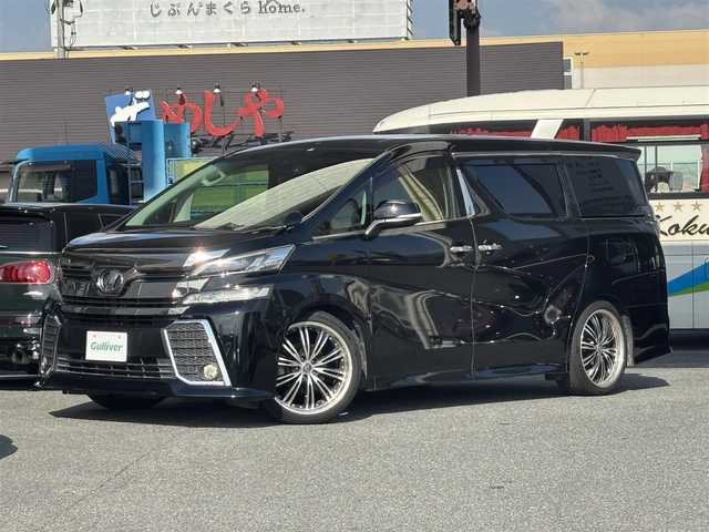 トヨタ ヴェルファイア Z Gエディション 奈良県 2016(平28)年 13万km ブラック ワンオーナー/アルパイン10インチナビ/CD/DVD/BT/USB/フルセグ/バックカメラ/黒半革シート/革調シートカバー/パワーシート（前席）/メモリーシート/ドライブレコーダー（前方）/ETC/ACC/PBD/横滑り防止装置/前後クリアランスソナー/レーダーブレーキサポート/両側パワースライドドア/LEDオートライト/フォグランプ（黄）/オートリトラウィンカーミラー/LEDルームランプ/フットランプ（青）/革巻きステアリング/ステアリングスイッチ/ステアリングヒーター/電子制御パーキングブレーキ/ブレーキホールド/オットマン/純正フロアマット/純正ドアバイザー/スペアスマートキー/新車時保証書/取扱説明書/ナビ取扱説明書/ディーラー記録簿R7