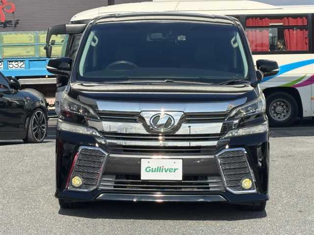 トヨタ ヴェルファイア Z Gエディション 奈良県 2016(平28)年 13万km ブラック ワンオーナー/アルパイン10インチナビ/CD/DVD/BT/USB/フルセグ/バックカメラ/黒半革シート/革調シートカバー/パワーシート（前席）/メモリーシート/ドライブレコーダー（前方）/ETC/ACC/PBD/横滑り防止装置/前後クリアランスソナー/レーダーブレーキサポート/両側パワースライドドア/LEDオートライト/フォグランプ（黄）/オートリトラウィンカーミラー/LEDルームランプ/フットランプ（青）/革巻きステアリング/ステアリングスイッチ/ステアリングヒーター/電子制御パーキングブレーキ/ブレーキホールド/オットマン/純正フロアマット/純正ドアバイザー/スペアスマートキー/新車時保証書/取扱説明書/ナビ取扱説明書/ディーラー記録簿R7