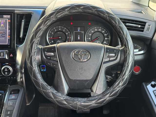 トヨタ ヴェルファイア Z Gエディション 奈良県 2016(平28)年 13万km ブラック ワンオーナー/アルパイン10インチナビ/CD/DVD/BT/USB/フルセグ/バックカメラ/黒半革シート/革調シートカバー/パワーシート（前席）/メモリーシート/ドライブレコーダー（前方）/ETC/ACC/PBD/横滑り防止装置/前後クリアランスソナー/レーダーブレーキサポート/両側パワースライドドア/LEDオートライト/フォグランプ（黄）/オートリトラウィンカーミラー/LEDルームランプ/フットランプ（青）/革巻きステアリング/ステアリングスイッチ/ステアリングヒーター/電子制御パーキングブレーキ/ブレーキホールド/オットマン/純正フロアマット/純正ドアバイザー/スペアスマートキー/新車時保証書/取扱説明書/ナビ取扱説明書/ディーラー記録簿R7