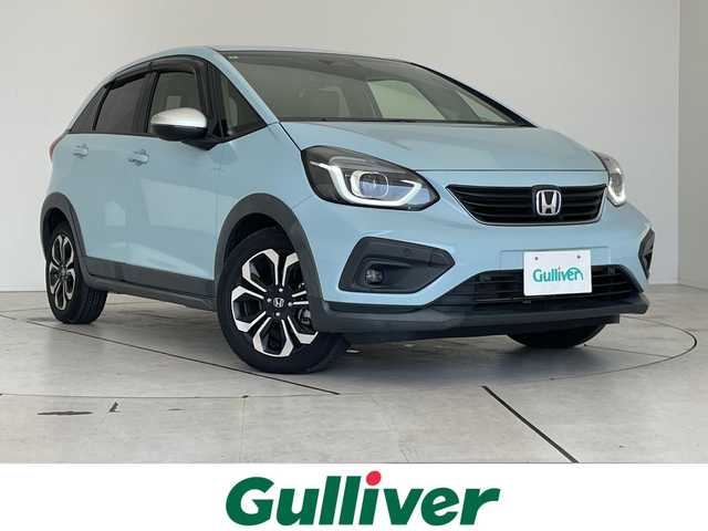 ホンダ フィット e:HEVクロスター 大阪府 2020(令2)年 4.1万km サーフブルー ホンダセンシング/純正9型ナビ/レーダークルーズコントロール/バックカメラ/コーナーセンサー/純正アルミホイール/ＥＴＣ/LEDヘッドライト/レーンキープアシスト/オートマチックハイビーム/ドライブレコーダー/衝突軽減システム/フルセグ/CD DVD/Bluetooth/ステアリングスイッチ/スマートキー/プッシュスタート