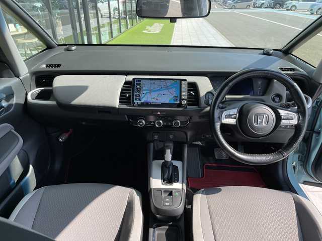 ホンダ フィット e:HEVクロスター 大阪府 2020(令2)年 4.1万km サーフブルー ホンダセンシング/純正9型ナビ/レーダークルーズコントロール/バックカメラ/コーナーセンサー/純正アルミホイール/ＥＴＣ/LEDヘッドライト/レーンキープアシスト/オートマチックハイビーム/ドライブレコーダー/衝突軽減システム/フルセグ/CD DVD/Bluetooth/ステアリングスイッチ/スマートキー/プッシュスタート