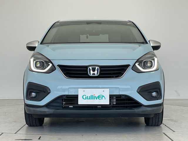 ホンダ フィット e:HEVクロスター 大阪府 2020(令2)年 4.1万km サーフブルー ホンダセンシング/純正9型ナビ/レーダークルーズコントロール/バックカメラ/コーナーセンサー/純正アルミホイール/ＥＴＣ/LEDヘッドライト/レーンキープアシスト/オートマチックハイビーム/ドライブレコーダー/衝突軽減システム/フルセグ/CD DVD/Bluetooth/ステアリングスイッチ/スマートキー/プッシュスタート