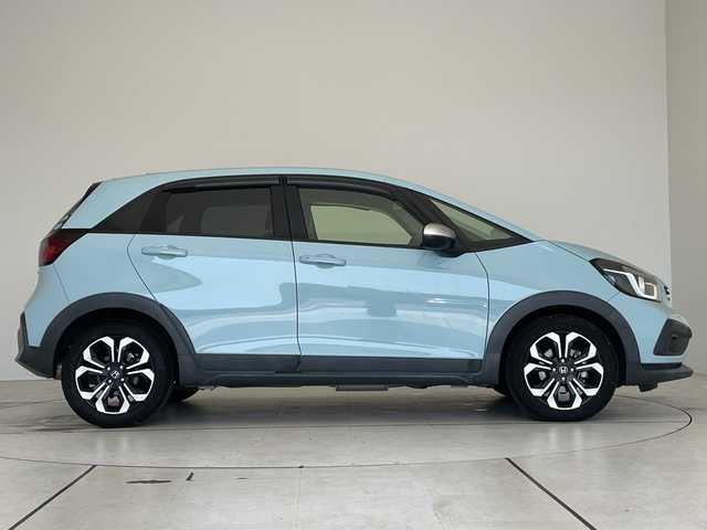 ホンダ フィット e:HEVクロスター 大阪府 2020(令2)年 4.1万km サーフブルー ホンダセンシング/純正9型ナビ/レーダークルーズコントロール/バックカメラ/コーナーセンサー/純正アルミホイール/ＥＴＣ/LEDヘッドライト/レーンキープアシスト/オートマチックハイビーム/ドライブレコーダー/衝突軽減システム/フルセグ/CD DVD/Bluetooth/ステアリングスイッチ/スマートキー/プッシュスタート