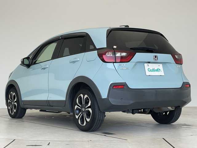 ホンダ フィット e:HEVクロスター 大阪府 2020(令2)年 4.1万km サーフブルー ホンダセンシング/純正9型ナビ/レーダークルーズコントロール/バックカメラ/コーナーセンサー/純正アルミホイール/ＥＴＣ/LEDヘッドライト/レーンキープアシスト/オートマチックハイビーム/ドライブレコーダー/衝突軽減システム/フルセグ/CD DVD/Bluetooth/ステアリングスイッチ/スマートキー/プッシュスタート