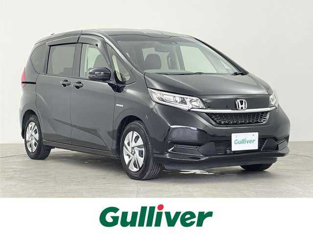 ホンダ フリード＋ ハイブリット G ホンダセンシング 千葉県 2020(令2)年 4.9万km クリスタルブラックパール ホンダセンシング /・衝突軽減ブレーキ /・先行車発進お知らせ機能 /・レーンキープアシスト /・標識認識機能 /・レーダークルーズコントロール /・横滑り防止装置 /社外ディスプレイオーディオ /・Bluetooth接続/・AppleCarPlay/・CD再生/・ビルトインETC/・バックモニター/バックカメラ/両側パワースライドドア/スマートキー/プッシュスタート/寒冷地仕様/フルオートエアコン /ウォークスルー/前席シートヒーター/オートLEDヘッドライト/電格ミラー/ステアリングスイッチ