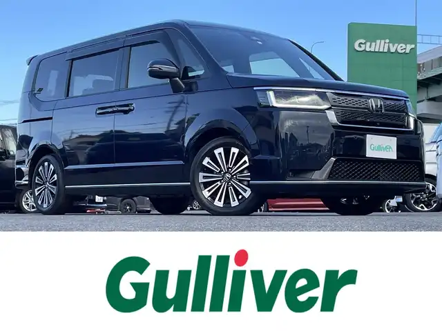 ホンダ ステップワゴン スパーダ eHEV プレミアムライン 愛知県 2023(令5)年 2.5万km ミッドナイトブルービームM 純正ナビ/（CD/DVD/FM/AM/BT/USB）/フルセグTV/アラウンドビューモニター/ETC/純正17インチAW/両側パワースライドドア/パワーバックドア/ホンダセンシング/レーダークルーズコントロール/ブラインドスポットモニター/ハーフレザーシート/前席シートヒーター/オートライト/LEDヘッドライト/ステアリングスイッチ/純正フロアマット