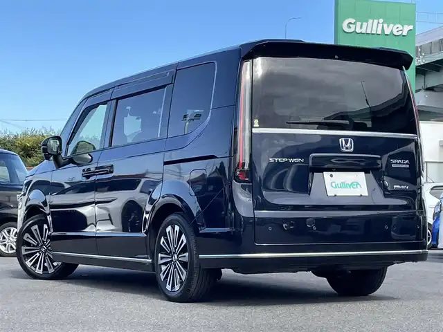 ホンダ ステップワゴン スパーダ eHEV プレミアムライン 愛知県 2023(令5)年 2.5万km ミッドナイトブルービームM 純正ナビ/（CD/DVD/FM/AM/BT/USB）/フルセグTV/アラウンドビューモニター/ETC/純正17インチAW/両側パワースライドドア/パワーバックドア/ホンダセンシング/レーダークルーズコントロール/ブラインドスポットモニター/ハーフレザーシート/前席シートヒーター/オートライト/LEDヘッドライト/ステアリングスイッチ/純正フロアマット