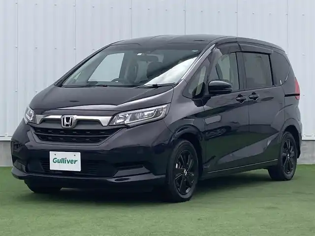 ホンダ フリード＋ ハイブリット G ブラックスタイル 香川県 2023(令5)年 2.9万km トワイライトミストブラックパール 登録時走行距離：28487km/ディーラー純正9型ナビ/　CD DVD BT フルセグTV/バックカメラ/ビルトインETC/前後ドライブレコーダー/両側パワースライドドア/衝突被害軽減/レーンキープアシスト/レーダークルーズコントロール/シートヒーター/ロールサンシェード/ISOFIX/横滑り防止装置/革巻きステアリング/ステアリングスイッチ/プッシュスタート/スマートキー