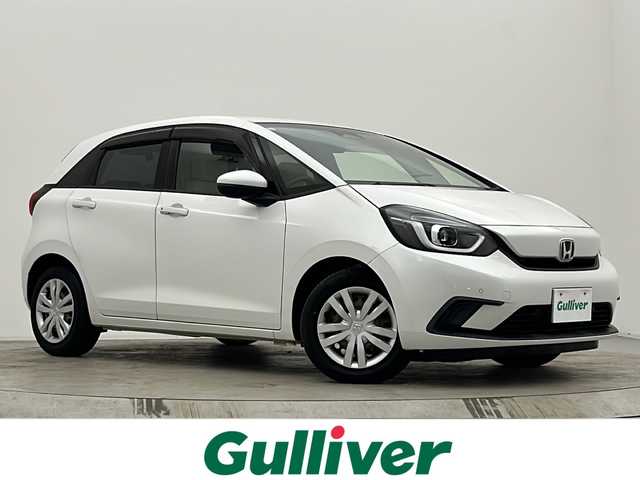ホンダ フィット ホーム 宮城県 2021(令3)年 4.7万km プラチナホワイトパール 寒冷地仕様/ワイパーデアイサー/純正9インチナビ/(AM/FM/TV/iPod/BT/SD/USB/CD/DVD)/前後ドライブレコーダー/レーダークルーズコントロール/ハーフレザー/プッシュスタート/スマートキー/オートライト/オートマチックハイビーム/LEDヘッドライト/純正フロアマット