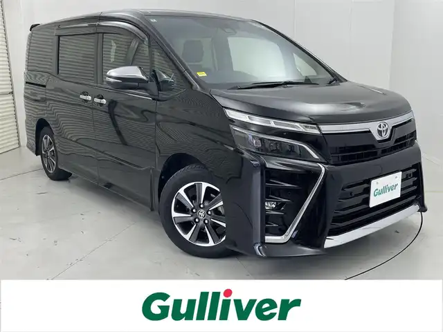 トヨタ ヴォクシー ZS 煌Ⅱ 茨城県 2020(令2)年 4.2万km ブラック 社外11型ナビ/バックカメラ/フルセグ/社外後席モニター/衝突被害軽減ブレーキ/車線逸脱抑制装置/クルーズコントロール/オートマチックハイビーム/クリアランスソナー/両側電動スライドドア/ETC/純正16インチAW/LEDヘッドライト/スマートキー