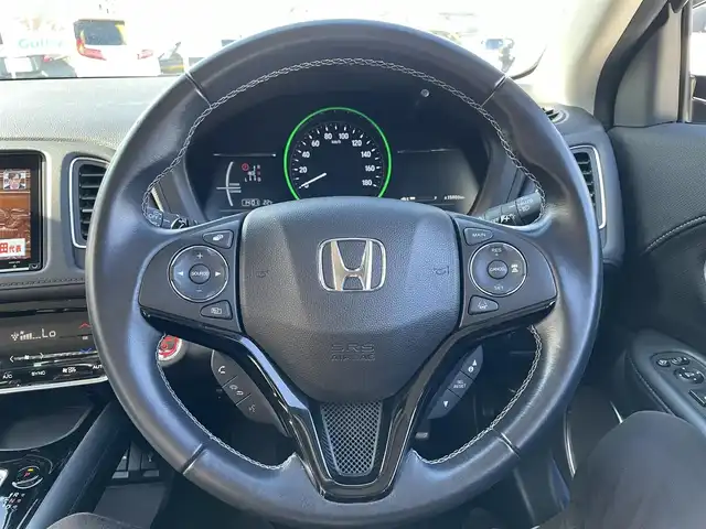 ホンダ ヴェゼル ハイブリッド Z ホンダセンシング 千葉県 2021(令3)年 2.2万km クリスタルブラックパール ホンダセンシング/・衝突軽減ブレーキ/・レーンキープアシスト/・標識認識機能/・先行車発進お知らせ機能/・アダプティブクルーズコントロール/純正8インチSDナビ【VXM-217VFEi】/・CD/DVD/MSV/Bluetooth/フルセグ/バックカメラ/ハーフレザーシート/前席シートヒーター/スマートキー/パドルシフト/リアクティブフォースペダル/純正LEDヘッドライト/フォグランプ/純正17インチアルミホイール/ビルトインETC/社外前後ドライブレコーダー/本革巻きステアリング/ドアバイザー/サイド＆カーテンエアバッグ