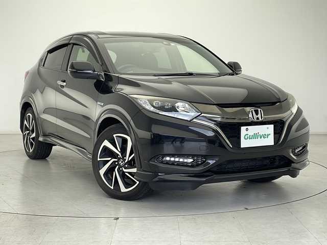ホンダ ヴェゼル ハイブリッド RS ホンダセンシング 千葉県 2016(平28)年 5.5万km クリスタルブラックパール 純正ナビ（ＶＸＭ－１６５ＶＦＥｉ）/バックカメラ/ハーフレザーシート/衝突軽減/レーダークルーズコントロール/パドルシフト/シートヒーター/革巻きステアリング/フルセグ/ＣＤ／ＤＶＤ再生/純正１８ＡＷ/電動パーキング/ブレーキホールド/ドアバイザー/LEDオートライト/フォグランプ/前後ドライブレコーダー/ドアバイザー/純正フロアマット/取扱説明書/保証書