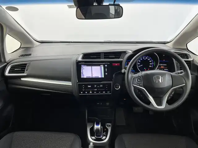 ホンダ フィット ハイブリット Fパッケージ 福井県 2014(平26)年 1.3万km ブリリアントスポーティブルーメタリック2トーン 純正ナビ/(ワンセグ/CD/MDMI/USB/Bluetooth)/バックカメラ/衝突軽減システム/ステアリングスイッチ/ETC/前方ドライブレコーダー/横滑り防止装置/電動格納ウインカーミラー/フロアマット/ドアバイザー/プッシュスタート/スマートキー/W＋サイド＋カーテンSRS＋ABS/取扱説明書