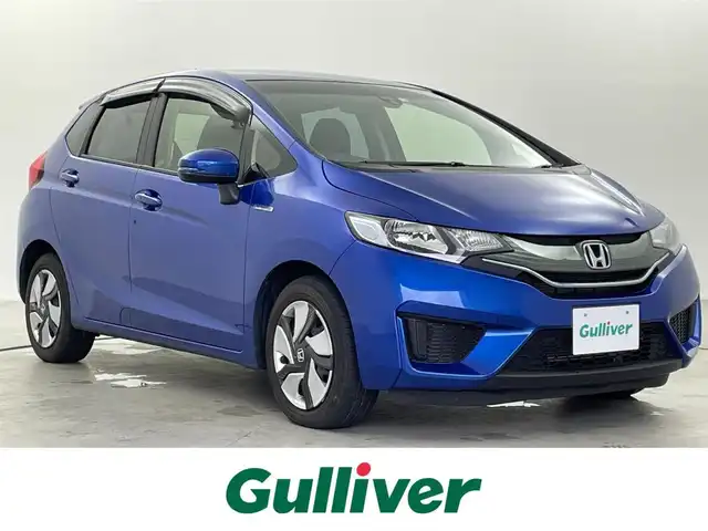 ホンダ フィット ハイブリット Fパッケージ 福井県 2014(平26)年 1.3万km ブリリアントスポーティブルーメタリック2トーン 純正ナビ/(ワンセグ/CD/MDMI/USB/Bluetooth)/バックカメラ/衝突軽減システム/ステアリングスイッチ/ETC/前方ドライブレコーダー/横滑り防止装置/電動格納ウインカーミラー/フロアマット/ドアバイザー/プッシュスタート/スマートキー/W＋サイド＋カーテンSRS＋ABS/取扱説明書
