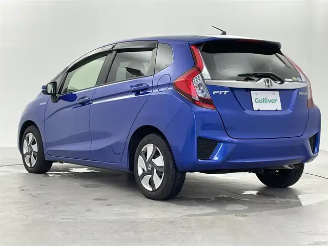 ホンダ フィット ハイブリット Fパッケージ 福井県 2014(平26)年 1.3万km ブリリアントスポーティブルーメタリック2トーン 純正ナビ/(ワンセグ/CD/MDMI/USB/Bluetooth)/バックカメラ/衝突軽減システム/ステアリングスイッチ/ETC/前方ドライブレコーダー/横滑り防止装置/電動格納ウインカーミラー/フロアマット/ドアバイザー/プッシュスタート/スマートキー/W＋サイド＋カーテンSRS＋ABS/取扱説明書