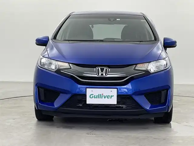 ホンダ フィット ハイブリット Fパッケージ 福井県 2014(平26)年 1.3万km ブリリアントスポーティブルーメタリック2トーン 純正ナビ/(ワンセグ/CD/MDMI/USB/Bluetooth)/バックカメラ/衝突軽減システム/ステアリングスイッチ/ETC/前方ドライブレコーダー/横滑り防止装置/電動格納ウインカーミラー/フロアマット/ドアバイザー/プッシュスタート/スマートキー/W＋サイド＋カーテンSRS＋ABS/取扱説明書