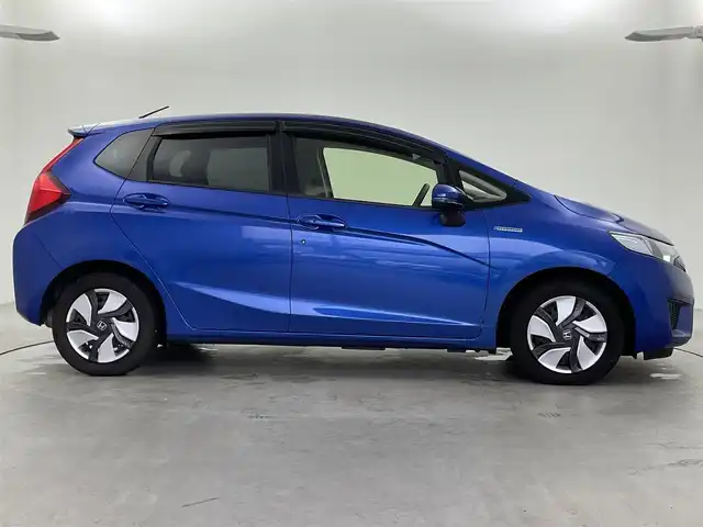 ホンダ フィット ハイブリット Fパッケージ 福井県 2014(平26)年 1.3万km ブリリアントスポーティブルーメタリック2トーン 純正ナビ/(ワンセグ/CD/MDMI/USB/Bluetooth)/バックカメラ/衝突軽減システム/ステアリングスイッチ/ETC/前方ドライブレコーダー/横滑り防止装置/電動格納ウインカーミラー/フロアマット/ドアバイザー/プッシュスタート/スマートキー/W＋サイド＋カーテンSRS＋ABS/取扱説明書