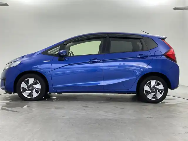 ホンダ フィット ハイブリット Fパッケージ 福井県 2014(平26)年 1.3万km ブリリアントスポーティブルーメタリック2トーン 純正ナビ/(ワンセグ/CD/MDMI/USB/Bluetooth)/バックカメラ/衝突軽減システム/ステアリングスイッチ/ETC/前方ドライブレコーダー/横滑り防止装置/電動格納ウインカーミラー/フロアマット/ドアバイザー/プッシュスタート/スマートキー/W＋サイド＋カーテンSRS＋ABS/取扱説明書