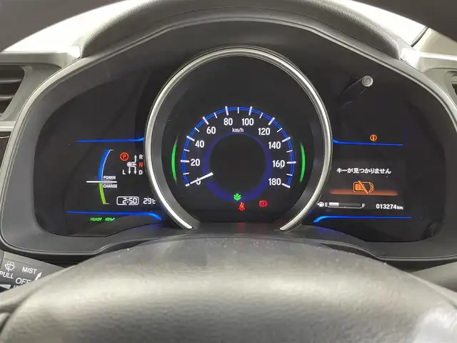 ホンダ フィット ハイブリット Fパッケージ 福井県 2014(平26)年 1.3万km ブリリアントスポーティブルーメタリック2トーン 純正ナビ/(ワンセグ/CD/MDMI/USB/Bluetooth)/バックカメラ/衝突軽減システム/ステアリングスイッチ/ETC/前方ドライブレコーダー/横滑り防止装置/電動格納ウインカーミラー/フロアマット/ドアバイザー/プッシュスタート/スマートキー/W＋サイド＋カーテンSRS＋ABS/取扱説明書