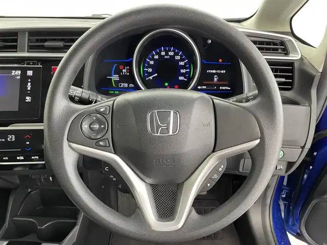 ホンダ フィット ハイブリット Fパッケージ 福井県 2014(平26)年 1.3万km ブリリアントスポーティブルーメタリック2トーン 純正ナビ/(ワンセグ/CD/MDMI/USB/Bluetooth)/バックカメラ/衝突軽減システム/ステアリングスイッチ/ETC/前方ドライブレコーダー/横滑り防止装置/電動格納ウインカーミラー/フロアマット/ドアバイザー/プッシュスタート/スマートキー/W＋サイド＋カーテンSRS＋ABS/取扱説明書