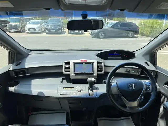 ホンダ フリード スパイク ハイブリット ジャストセレクション 愛知県 2014(平26)年 3.5万km モダンスティールM ワンオーナー/社外SDナビ/【フルセグ/CD/DVD/Bluetooth】/バックカメラ/クルーズコントロール/片側パワースライドドア/横滑り防止装置/オートライト/純正フロアマット/キーレス/保証書/取扱説明書