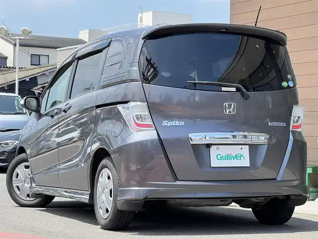 ホンダ フリード スパイク ハイブリット ジャストセレクション 愛知県 2014(平26)年 3.5万km モダンスティールM ワンオーナー/社外SDナビ/【フルセグ/CD/DVD/Bluetooth】/バックカメラ/クルーズコントロール/片側パワースライドドア/横滑り防止装置/オートライト/純正フロアマット/キーレス/保証書/取扱説明書
