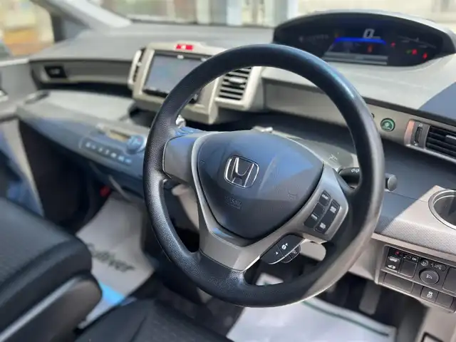 ホンダ フリード スパイク ハイブリット ジャストセレクション 愛知県 2014(平26)年 3.5万km モダンスティールM ワンオーナー/社外SDナビ/【フルセグ/CD/DVD/Bluetooth】/バックカメラ/クルーズコントロール/片側パワースライドドア/横滑り防止装置/オートライト/純正フロアマット/キーレス/保証書/取扱説明書