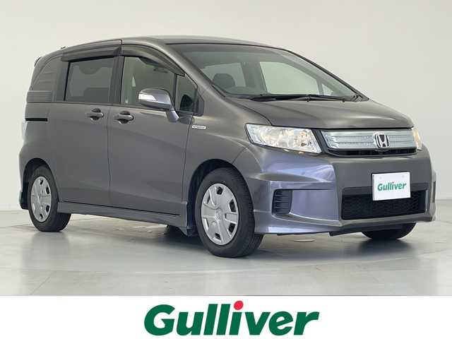 ホンダ フリード スパイク ハイブリット ジャストセレクション 愛知県 2014(平26)年 3.5万km モダンスティールM ワンオーナー/社外SDナビ/【フルセグ/CD/DVD/Bluetooth】/バックカメラ/クルーズコントロール/片側パワースライドドア/横滑り防止装置/オートライト/純正フロアマット/キーレス/保証書/取扱説明書