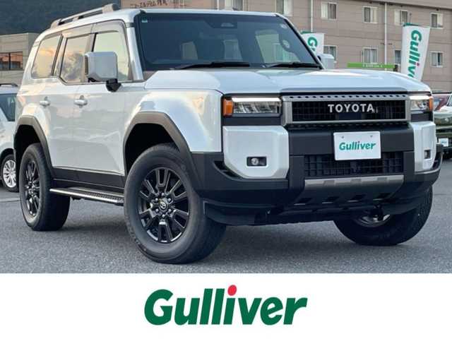 トヨタ ランドクルーザー ２５０ VX 広島県 2024(令6)年 0.1千km プラチナホワイトパールマイカ 登録時走行距離60km/ワンオーナー/サンルーフ/純正ナビ（HDMI/フルセグTV/Bluetooth）/全方位モニター/ETC2.0/デジタルインナーミラー/ルーフレール/黒レザーシート/・シートヒーター/・エアシート/・パワーシート/衝突被害軽減ブレーキ/車線逸脱警報/オートマチックハイビーム/ブラインドスポットモニター/レーダークルーズコントロール/コーナーセンサー/ステアリングヒーター/パワーバックドア/スペアキー
