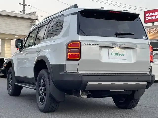 トヨタ ランドクルーザー ２５０ VX 広島県 2024(令6)年 0.1千km プラチナホワイトパールマイカ 登録時走行距離60km/ワンオーナー/サンルーフ/純正ナビ（HDMI/フルセグTV/Bluetooth）/全方位モニター/ETC2.0/デジタルインナーミラー/ルーフレール/黒レザーシート/・シートヒーター/・エアシート/・パワーシート/衝突被害軽減ブレーキ/車線逸脱警報/オートマチックハイビーム/ブラインドスポットモニター/レーダークルーズコントロール/コーナーセンサー/ステアリングヒーター/パワーバックドア/スペアキー