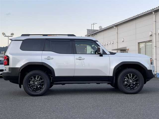 トヨタ ランドクルーザー ２５０ VX 広島県 2024(令6)年 0.1千km プラチナホワイトパールマイカ 登録時走行距離60km/ワンオーナー/アドバンストドライブ/サンルーフ/純正ナビ（HDMI/フルセグTV/Bluetooth）/全方位モニター/ETC2.0/デジタルインナーミラー/ルーフレール/黒レザーシート/・シートヒーター/・エアシート/・パワーシート/衝突被害軽減ブレーキ/車線逸脱警報/オートマチックハイビーム/ブラインドスポットモニター/レーダークルーズコントロール/コーナーセンサー/ステアリングヒーター/パワーバックドア/スペアキー