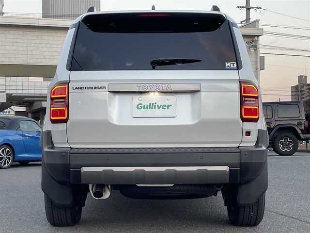 トヨタ ランドクルーザー ２５０ VX 広島県 2024(令6)年 0.1千km プラチナホワイトパールマイカ 登録時走行距離60km/ワンオーナー/アドバンストドライブ/サンルーフ/純正ナビ（HDMI/フルセグTV/Bluetooth）/全方位モニター/ETC2.0/デジタルインナーミラー/ルーフレール/黒レザーシート/・シートヒーター/・エアシート/・パワーシート/衝突被害軽減ブレーキ/車線逸脱警報/オートマチックハイビーム/ブラインドスポットモニター/レーダークルーズコントロール/コーナーセンサー/ステアリングヒーター/パワーバックドア/スペアキー