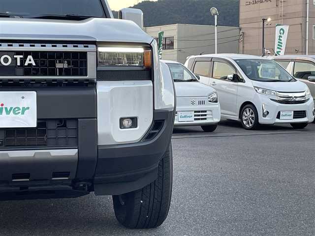 トヨタ ランドクルーザー ２５０ VX 広島県 2024(令6)年 0.1千km プラチナホワイトパールマイカ 登録時走行距離60km/ワンオーナー/アドバンストドライブ/サンルーフ/純正ナビ（HDMI/フルセグTV/Bluetooth）/全方位モニター/ETC2.0/デジタルインナーミラー/ルーフレール/黒レザーシート/・シートヒーター/・エアシート/・パワーシート/衝突被害軽減ブレーキ/車線逸脱警報/オートマチックハイビーム/ブラインドスポットモニター/レーダークルーズコントロール/コーナーセンサー/ステアリングヒーター/パワーバックドア/スペアキー