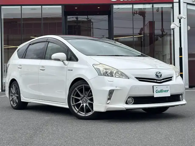 トヨタ プリウス α G チューンブラック 宮城県 2013(平25)年 6.5万km パール 登録時走行距離　６４１２８ｋｍ/DVD・AM・FM・BT/ガラスルーフ/電動ミラー/オートPW/社外AW１８インチO.Zナットカバー/純正ドアバイザー/プッシュスタート/パワーステアリング/アイドリングストップ/Bluetooth接続/ABSサポート/横滑り防止装置/LEDオートライト