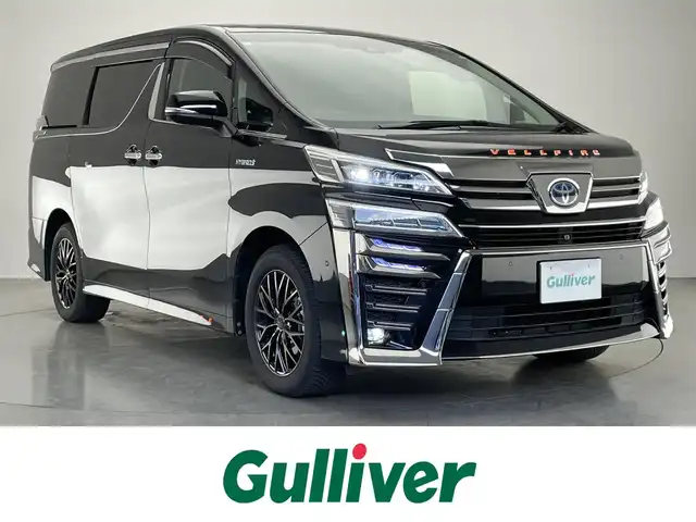 トヨタ ヴェルファイア ハイブリット ZR Gエディション 愛知県 2020(令2)年 5.9万km ブラック メーカーナビ　リヤエンターテイメント　三眼ＬＥＤ　ＪＢＬ　全方位カメラ　パーキングアシスト　シートヒーター　ＨＤＭＩ　追従クルコン　フルセグＴＶ　BSM　ＥＴＣ　ドラレコ　セーフティセンス　禁煙　DVD再生　メモリーシート　両側パワスラ　コーナーセンサー　ステアイングヒーター　エアシート　パワーシート　Bluetooth　USB接続　パワーバックドア　オートハイビーム　衝突軽減　車線逸脱　社外LEONISアルミ　プッシュスタート　スマートキー　