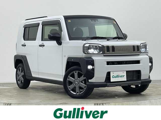 ダイハツ タフト G ターボ ダーククロムベンチャー 宮城県 2023(令5)年 0.6万km シャイニングホワイトパール 純正7インチナビ/全方位カメラ/ガラスルーフ/アダプティブクルーズコントロール/レーンアシスト/障害物センサー/電動パーキング/オートブレーキホールド/衝突軽減/アイドリングストップ/横滑り防止/ステアリングスイッチ/シートヒーター/オートライト/スマートキー/プッシュスタート/LEDライト/純正アルミホイール/スペアキー１本/禁煙車