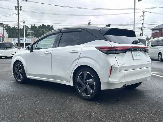 日産 オーラ G レザーエディション 鹿児島県 2022(令4)年 6.1万km ピュアホワイトパール / スーパーブラック 2トーン 純正ナビ//AM/FM/Bluetooth/Apple/Google検索/BOSEスピーカー/ETC/デジタルミラー/プロパイロット/インテリジェンスクルーズ/ハンドル支援/ハンドルヒーター/シートヒーター/横滑り防止装置/電動格納ミラー/ドアバイザー/純正AW17