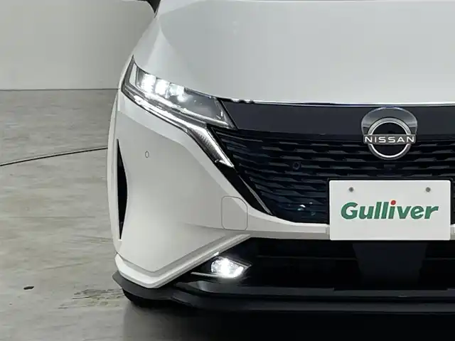 日産 オーラ G レザーエディション 福岡県 2022(令4)年 6.1万km ピュアホワイトパール / スーパーブラック 2トーン 純正９型ＤＡ　/全方位カメラ　/エマージェンシーブレーキ　/プロパイロット　/レーンキープ　/コーナーセンサー　/ＢＯＳＥサウンド　/シートヒーター　/ステアリングヒーター　/置くだけ充電　/ＢＳＭ　/ＥＴＣ２．０　/ＬＥＤ