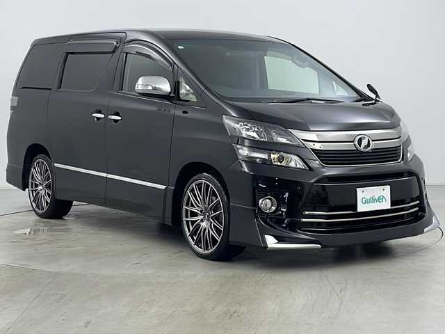 トヨタ ヴェルファイア 2．4Z ゴールデンアイズ 道央・札幌 2012(平24)年 7.4万km ブラック ・4WD/・寒冷地仕様/・アルパインナビ（TV＆CD＆DVD＆BT＆HDMI）/・アルパインフリップダウンモニター/・ミラー型ドライブレコーダー/・社外レーダー/・ステアリングスイッチ/・クルーズコントロール/・両側パワースライドドア/・パワーバックドア/・ドアミラーヒーター/・オートライト/・LEDヘッドライト/・LEDフォグランプ